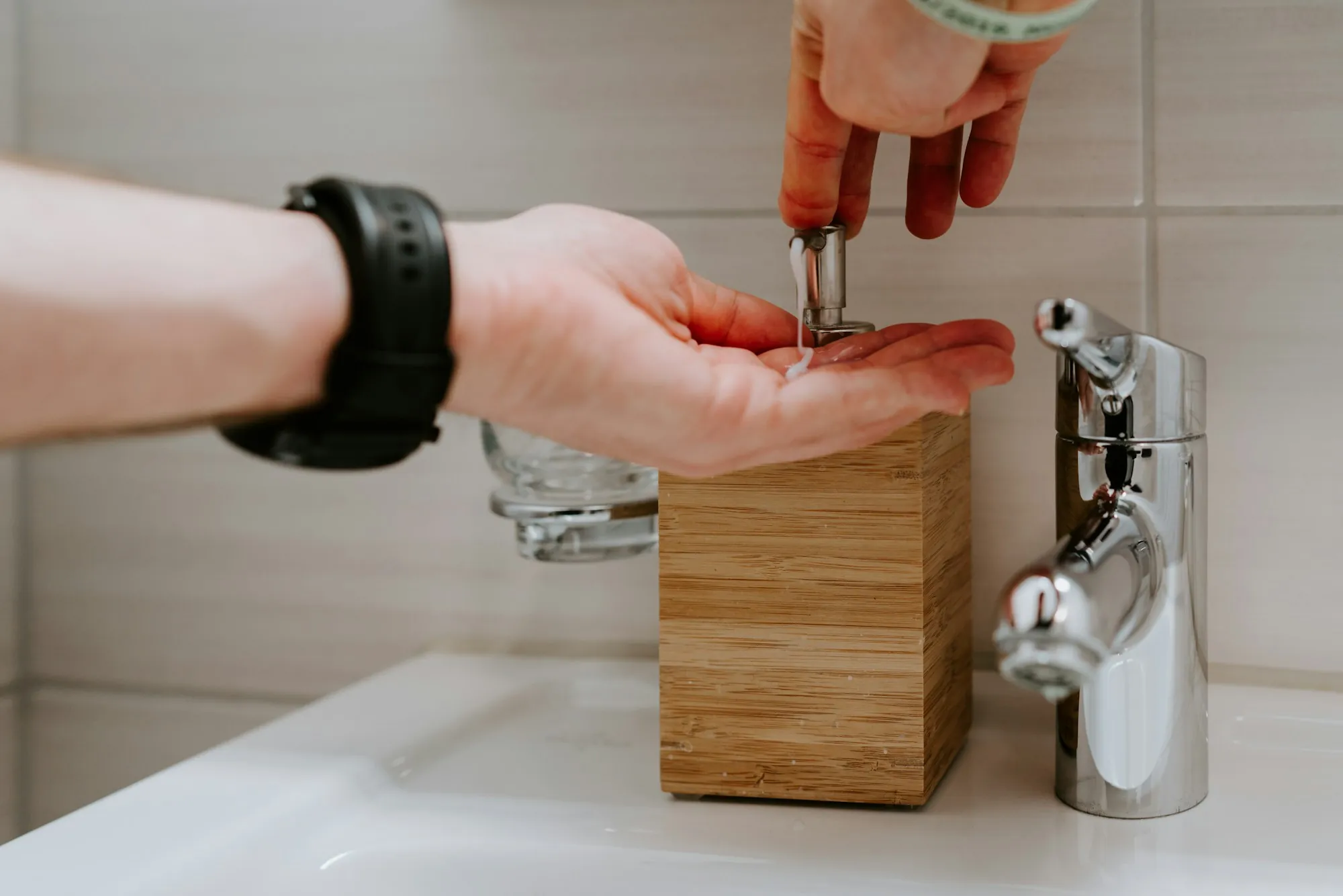 A Test-First Approach to Santa Ana Water Hands at a white sink with a chrome faucet