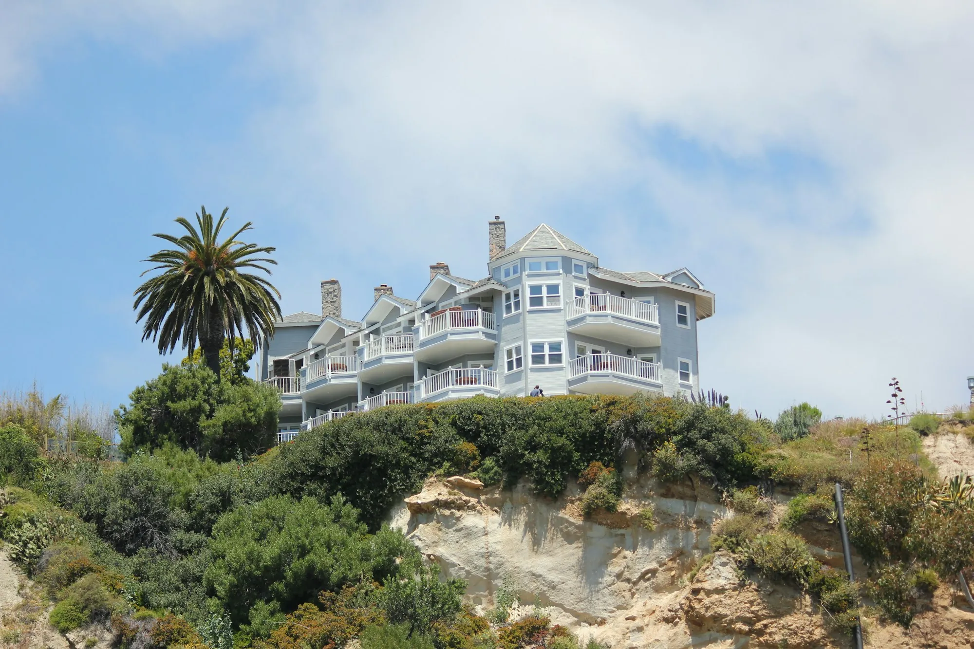 About Santa Ana Water Systems House on a hillside with a palm tree